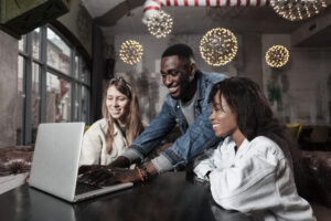 lovely-friends-looking-laptop-indoors